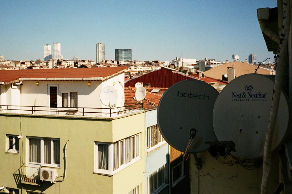 Buildings all over the city are dotted with satellite dishes 